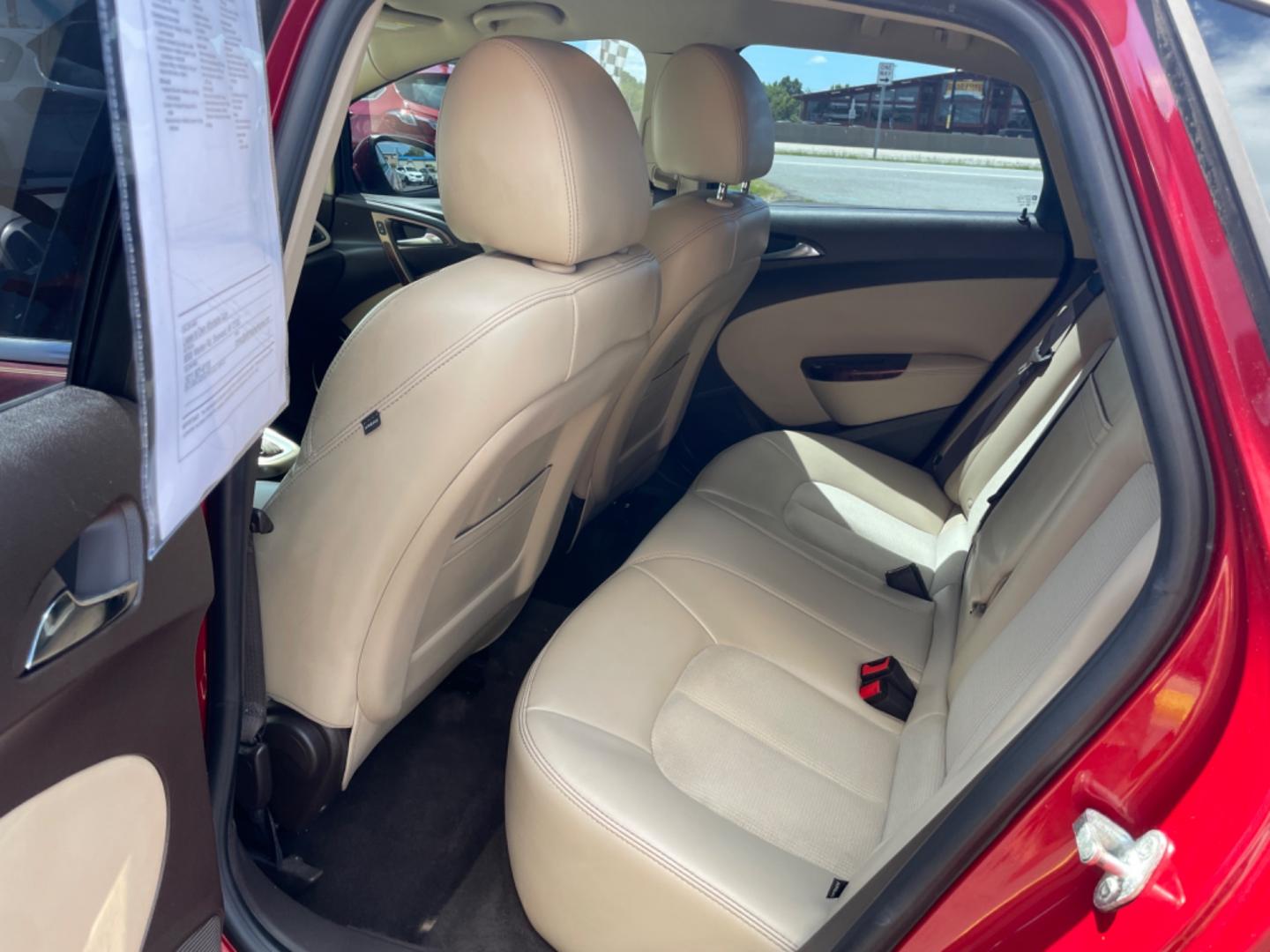 2014 Maroon Buick Verano (1G4PR5SK6E4) with an 4-Cyl, ECOTEC, 2.4 Liter engine, Auto, 6-Spd w/Shft Ctrl transmission, located at 8008 Warden Rd, Sherwood, AR, 72120, (501) 801-6100, 34.830078, -92.186684 - Photo#11